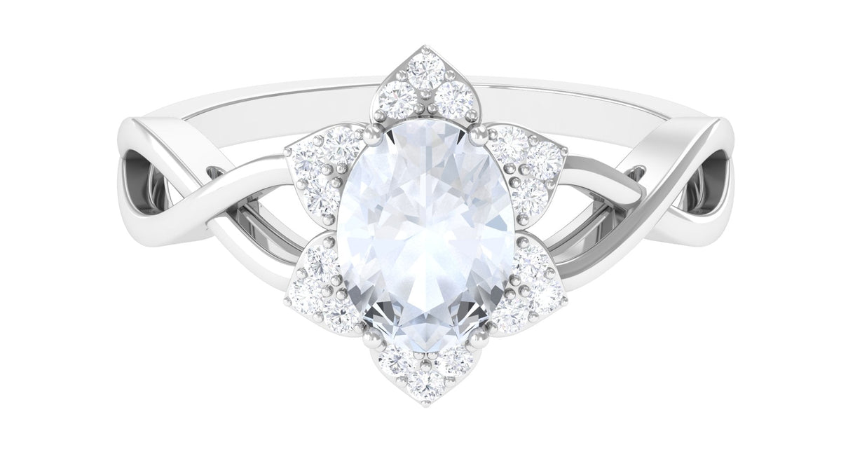 Rosec Jewels 3/4 CT oval moonstone and diamond floral halo ring showing the detailed ring with floral design and sparkling gemstones.