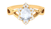 Oval cut moonstone and diamond floral halo ring with 3/4 carat total weight, set in a Rosec Jewels solitaire ring design.