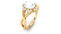 Oval cut moonstone and diamond floral halo ring with 3/4 carat total weight, set in a Rosec Jewels solitaire ring.