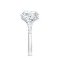 Elegant 1 carat moissanite oval engagement ring with bypass shank from Rosec Jewels, showcasing sparkling center stone and intricate band design.