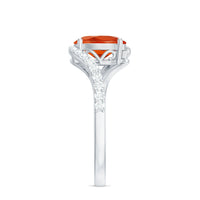 Oval cut fire opal and diamond bypass ring from Rosec Jewels, featuring a unique design with sparkling gemstones.