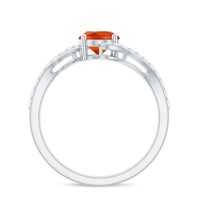 Oval cut solitaire fire opal and diamond bypass ring from Rosec Jewels, showcasing the elegant design and sparkling gemstones.