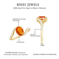 Oval cut fire opal and diamond bypass ring by Rosec Jewels, showcasing a unique design with vibrant gemstone and sparkling accents.