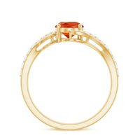 Oval cut fire opal and diamond bypass ring by Rosec Jewels, showcasing a unique design with vibrant gemstones and elegant metalwork.