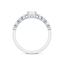 Octagon cut zircon engagement ring with side stones from Rosec Jewels, showcasing a sparkling central gemstone and elegant band design.