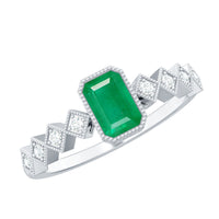Vintage-looking emerald cut emerald engagement ring with diamond accents by Rosec Jewels, showcasing intricate design and sparkling gemstones.