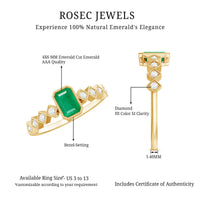 Vintage emerald cut emerald engagement ring with diamond accents by Rosec Jewels, showcasing an elegant, timeless design.