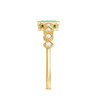 Vintage-style emerald cut emerald engagement ring with diamond accents from Rosec Jewels, showcasing intricate metalwork and sparkling gemstones.