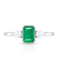 Emerald 3-stone ring with diamond accents by Rosec Jewels, showcasing vibrant green emeralds and sparkling diamonds in a elegant ring setting.