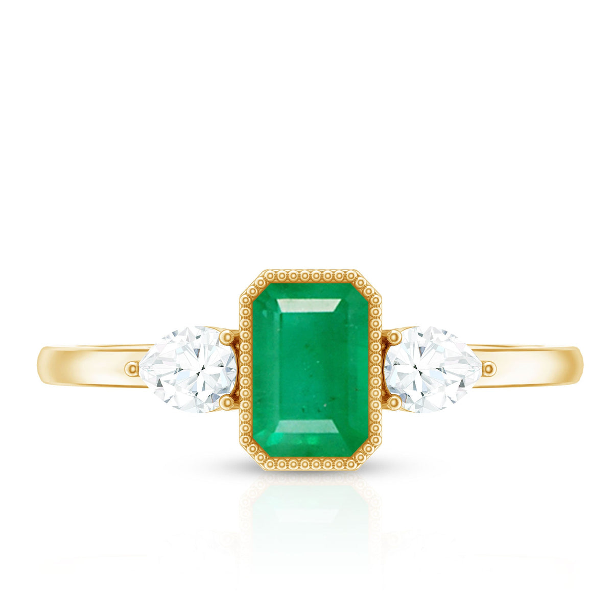 Emerald 3-stone ring with diamonds from Rosec Jewels, showcasing a detailed view of the elegant gemstone and sparkling accents.