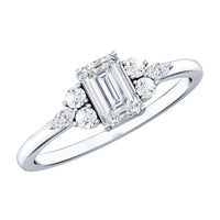 Octagon cut cubic zirconia engagement ring with trio stones by Rosec Jewels, showcasing detailed design and sparkling gemstones.