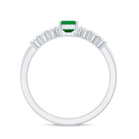 Pair of natural emerald cut diamond and emerald wedding rings set by Rosec Jewels, featuring elegant designs and sparkling gemstones.