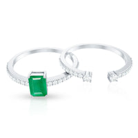 Genuine emerald cut diamond engagement ring and wedding band set by Rosec Jewels featuring emerald gemstones and sparkling metal bands.