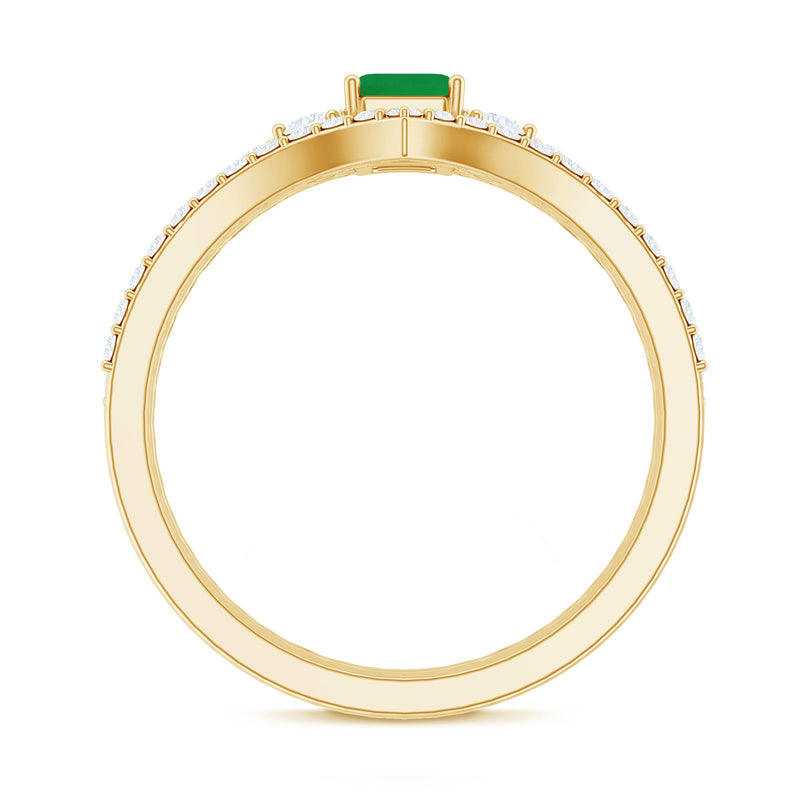 Natural emerald cut emerald and diamond bridal ring set by Rosec Jewels, featuring three elegant rings with intricate detailing.