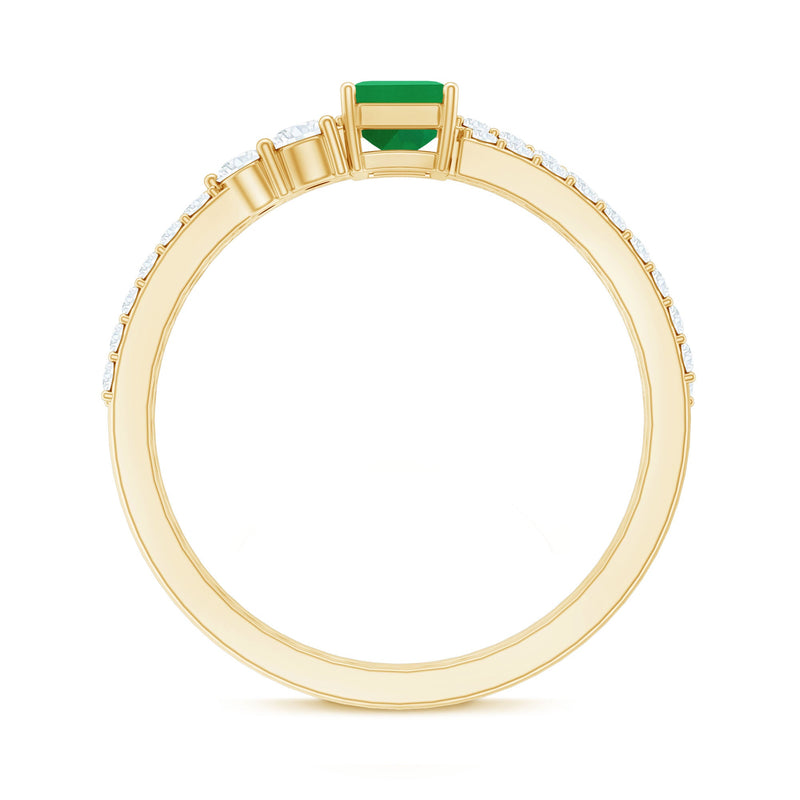 Genuine emerald cut diamond engagement ring with enhancer from Rosec Jewels, featuring a central emerald gemstone and intricate band details.