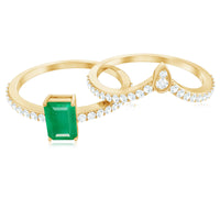 Certified natural emerald and diamond engagement and wedding ring set by Rosec Jewels, featuring emerald cut designs with detailed craftsmanship.