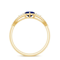 Real 0.6 carat blue sapphire and diamond heart promise ring with split shank by Rosec Jewels, featuring a elegant heart design.