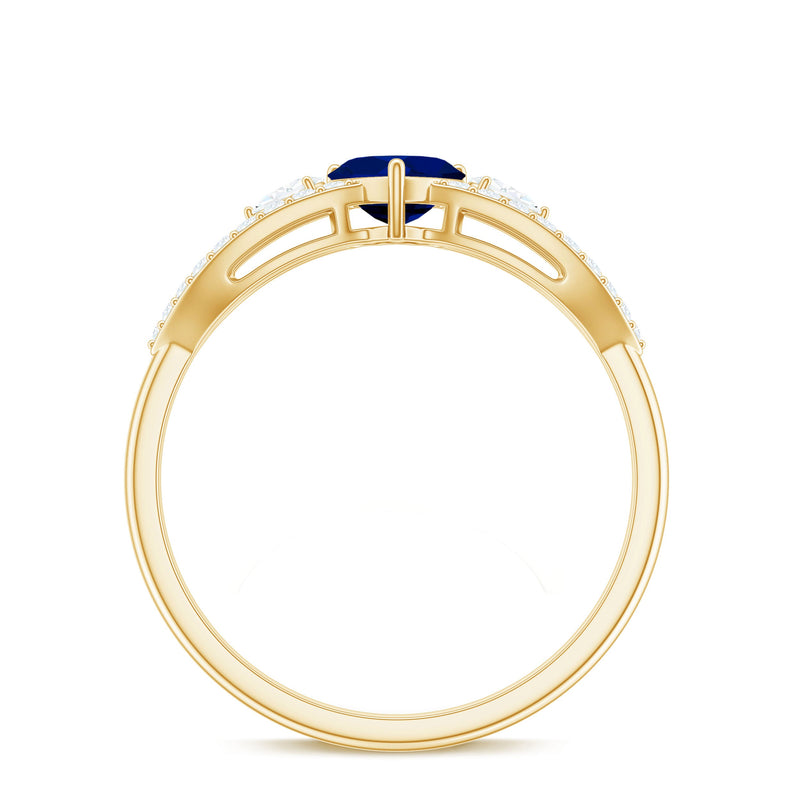 Real 0.6 carat blue sapphire and diamond heart promise ring with split shank by Rosec Jewels, featuring a elegant heart design.