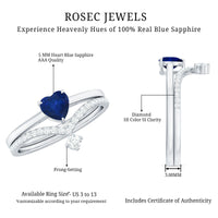 Heart-shaped blue sapphire solitaire wedding ring set with diamonds, featuring elegant rings from Rosec Jewels.