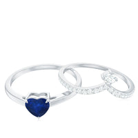 Heart-shaped blue sapphire solitaire wedding ring set with diamonds, featuring elegant band design by Rosec Jewels.