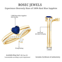 Heart-shaped blue sapphire solitaire wedding ring set with diamond accents, featuring a rose gold band from Rosec Jewels.
