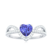 Heart-shaped tanzanite and diamond engagement ring by Rosec Jewels featuring intricate design and sparkling gemstones.