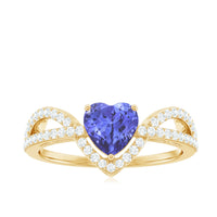 Heart-shaped Tanzanite and diamond engagement ring by Rosec Jewels featuring intricate design and sparkling gemstones.