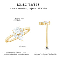 Rosec Jewels 1 CT cubic zirconia heart engagement ring with side stones, featuring a sparkling center stone and detailed band design.