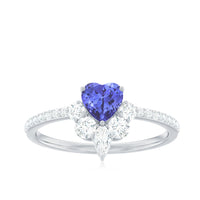 Natural Tanzanite and diamond heart promise ring by Rosec Jewels, featuring a blue tanzanite center stone with sparkling diamonds.