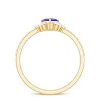 Natural Tanzanite and diamond heart promise ring by Rosec Jewels, showcasing a delicate gold band with a heart-shaped tanzanite centerpiece.