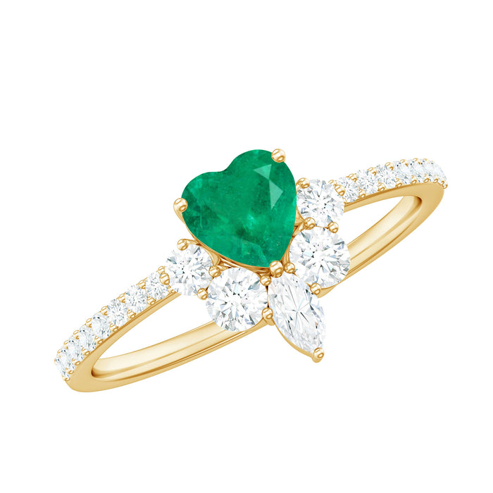 Natural emerald heart promise ring with diamond accents, crafted by Rosec Jewels, featuring a green emerald and sparkling diamonds.