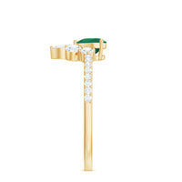 Natural emerald heart promise ring with diamond accents by Rosec Jewels, showcasing a delicate emerald heart centerpiece and sparkling diamonds.
