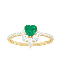 Natural emerald heart promise ring with diamond accents from Rosec Jewels, featuring a green emerald heart centerpiece and sparkling diamonds.