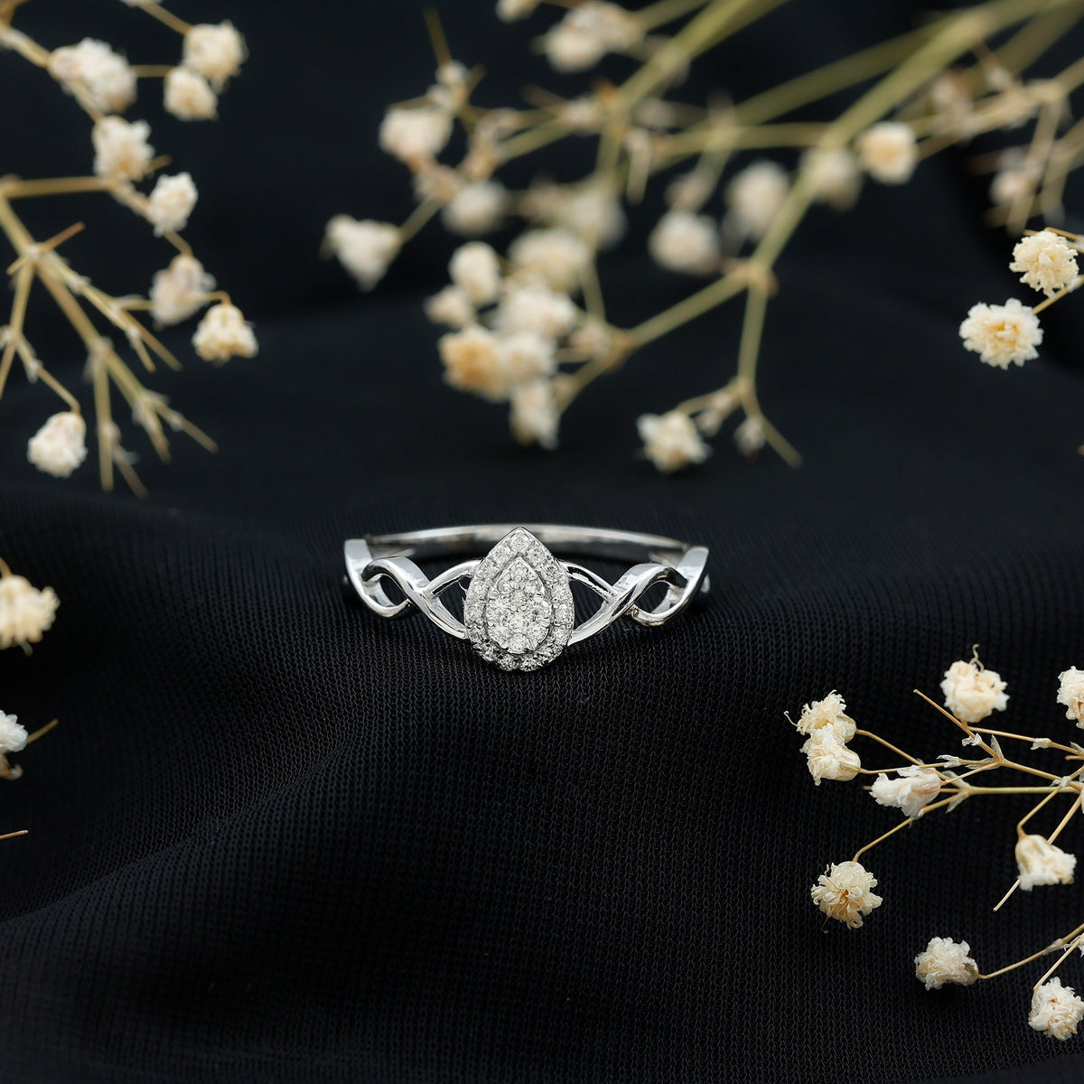 Round moissanite crossover halo engagement ring from Rosec Jewels with illusion set design and intricate band details.