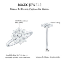 Rosec Jewels cubic zirconia flower cluster engagement ring with sparkling floral design and silver band.