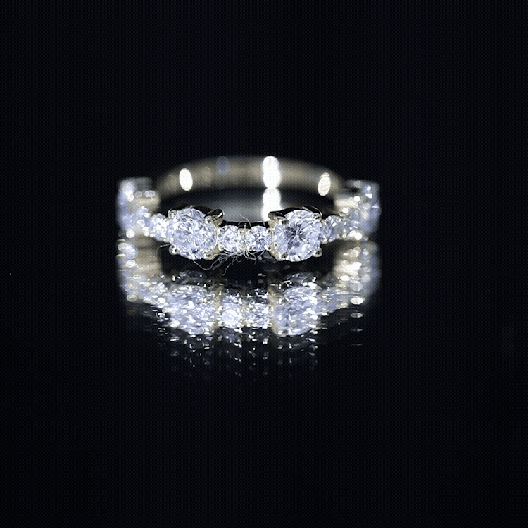 Yellow gold round moissanite half eternity wedding band featuring sparkling stones, crafted by Rosec Jewels.