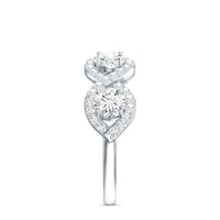 Round moissanite infinity wedding band ring by Rosec Jewels, showcasing the sparkling ring with infinity design and round moissanite stones.