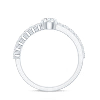 Round cut moissanite engagement ring with side stones from Rosec Jewels, featuring a detailed close-up of the sparkling ring design.