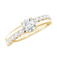 Round cut moissanite engagement ring with side stones, featuring a polished band and sparkling gemstone setting by Rosec Jewels.