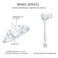 Rosec Jewels zircon teardrop engagement ring with cluster accents, featuring sparkling teardrop-shaped and cluster zircon details.