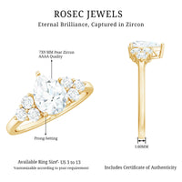 Rosec Jewels Zircon teardrop engagement ring with cluster accent, showcasing sparkling teardrop-shaped zircon stones on a silver band.