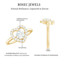 Round cut zircon heart engagement ring with halo setting from Rosec Jewels, featuring a sparkling central stone and intricate band detail.