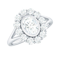 Oval cut moissanite halo engagement ring with split shank in rose gold, featuring intricate detailing and sparkling gemstone accents.