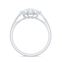 Oval cut moissanite halo engagement ring with split shank in sterling silver from Rosec Jewels.