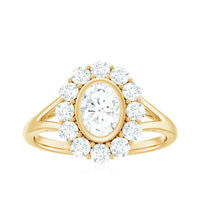 Oval cut moissanite halo engagement ring with split shank from Rosec Jewels, featuring sparkling center stone and elegant band design.