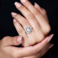 Oval Shaped Moissanite Flower Engagement Ring