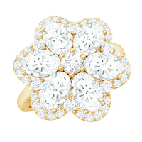 Large flower-shaped moissanite engagement ring from Rosec Jewels featuring intricate floral design and sparkling stone accents.
