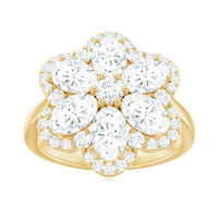 Large flower-shaped moissanite engagement ring from Rosec Jewels featuring sparkling center stone and intricate floral design.