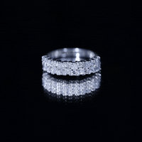 Yellow gold double row moissanite eternity wedding band ring with sparkling gemstones from Rosec Jewels.