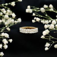 Double row moissanite eternity wedding band by Rosec Jewels, showcasing sparkling moissanite stones on a sleek silver ring.